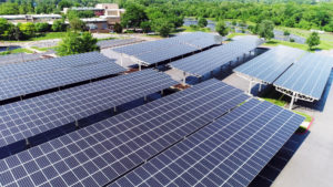 Parking with solar photovoltaic panels roof