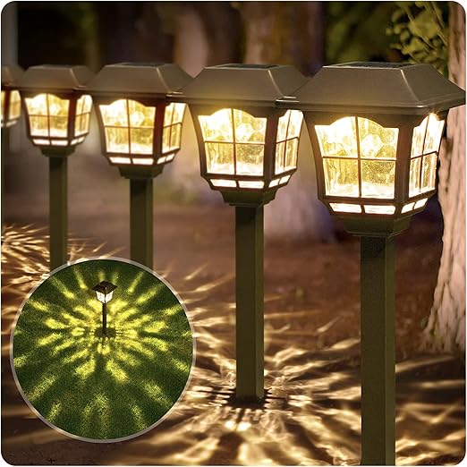 Bronze solar pathway lights lining a garden path